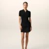 Mini-jupe en laine vierge noire avec ceinture à grande boucle