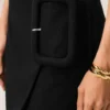 Mini-jupe en laine vierge noire avec ceinture à grande boucle