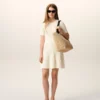 Mini-robe Godet en maille blanche