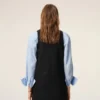 Mini-robe noire en laine vierge avec ceinture