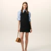 Mini-robe noire en laine vierge avec ceinture