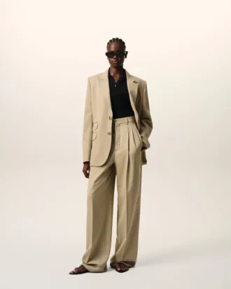 Pantalon beige en laine vierge à taille haute et jambes larges