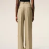 Pantalon beige en laine vierge à taille haute et jambes larges