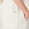 Pantalon blanc en lin mélangé à taille élastiquée