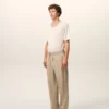 Pantalon en coton beige à taille élastiquée