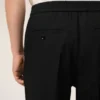 Pantalon en laine noire à taille élastiquée