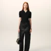 Pantalon en satin noir avec ceinture à boucle