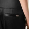 Pantalon en satin noir avec ceinture à boucle
