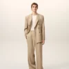 Pantalon large taille basse en laine vierge beige
