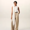 Pantalon large taille haute en laine vierge beige avec deux plis
