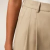 Pantalon large taille haute en laine vierge beige avec deux plis