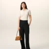 Pantalon noir en laine vierge à ceinture nouée