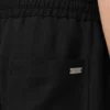 Pantalon noir en lin mélangé à taille élastiquée