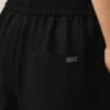 Pantalon noir en lin mélangé à taille élastiquée
