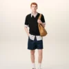 Polo noir à manches courtes en maille