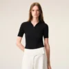 Polo noir à manches courtes en maille