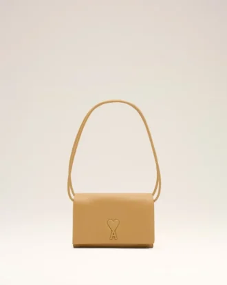 Portefeuille Voulez-Vous en cuir de vachette jaune avec lanière