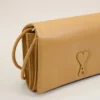 Portefeuille Voulez-Vous en cuir de vachette jaune avec lanière