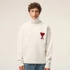 Pull à col cheminée en laine naturelle avec motif Ami de Coeur contrasté