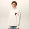 Pull à col cheminée en laine naturelle avec motif Ami de Coeur contrasté