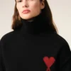 Pull à col cheminée en laine noire avec motif « Ami de Coeur » contrasté