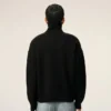 Pull à col cheminée en laine noire avec motif « Ami de Coeur » contrasté