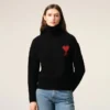 Pull à col cheminée en laine noire avec motif « Ami de Coeur » contrasté
