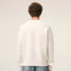 Pull à col rond en laine naturelle avec motif Ami de Coeur contrasté