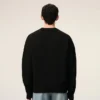 Pull à col rond en laine noire avec motif Ami de Coeur contrasté