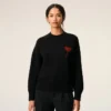 Pull à col rond en laine noire avec motif Ami de Coeur contrasté