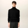 Pull à col roulé Ami de Coeur en laine noire