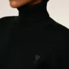 Pull à col roulé Ami de Coeur en laine noire