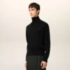 Pull à col roulé Ami de Coeur en laine noire