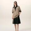 Pull à manches courtes en laine beige, col en V