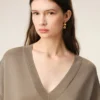 Pull à manches courtes en laine beige, col en V
