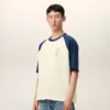 T-shirt Ami de Coeur en coton blanc et bleu avec patch tricoté