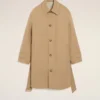 Trench-coat beige en sergé de coton déperlant avec ceinture