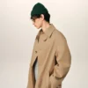 Trench-coat beige en sergé de coton déperlant avec ceinture
