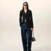 Veste ajustée à simple boutonnage en laine vierge noire