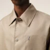 Veste Ami de Coeur en nylon beige à boutons-pression