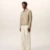 Veste Ami de Coeur en nylon beige à boutons-pression