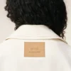Veste de travail boutonnée en coton blanc