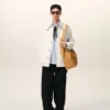 Veste de travail boutonnée en coton blanc