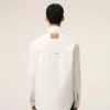 Veste de travail boutonnée en coton blanc