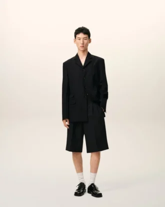 Veste droite en laine vierge noire à simple boutonnage