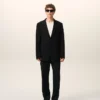 Veste droite en laine vierge noire à simple boutonnage