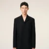 Veste droite en laine vierge noire à simple boutonnage