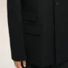 Veste droite en laine vierge noire à simple boutonnage