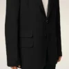 Veste droite en laine vierge noire à simple boutonnage