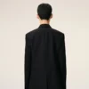 Veste droite en laine vierge noire à simple boutonnage